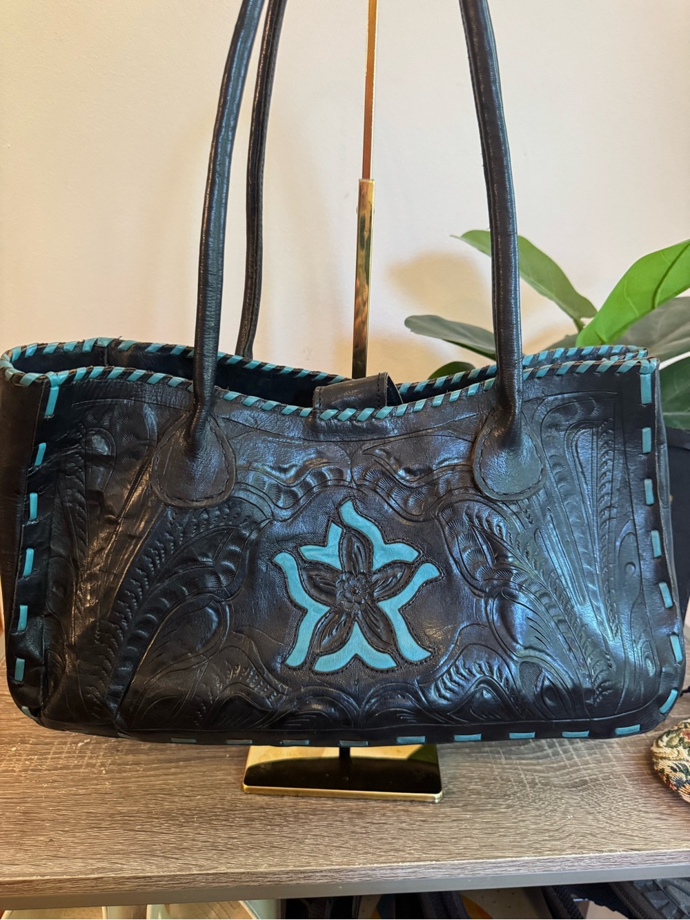 Leaders in leather hand tooled leather shoulder bag